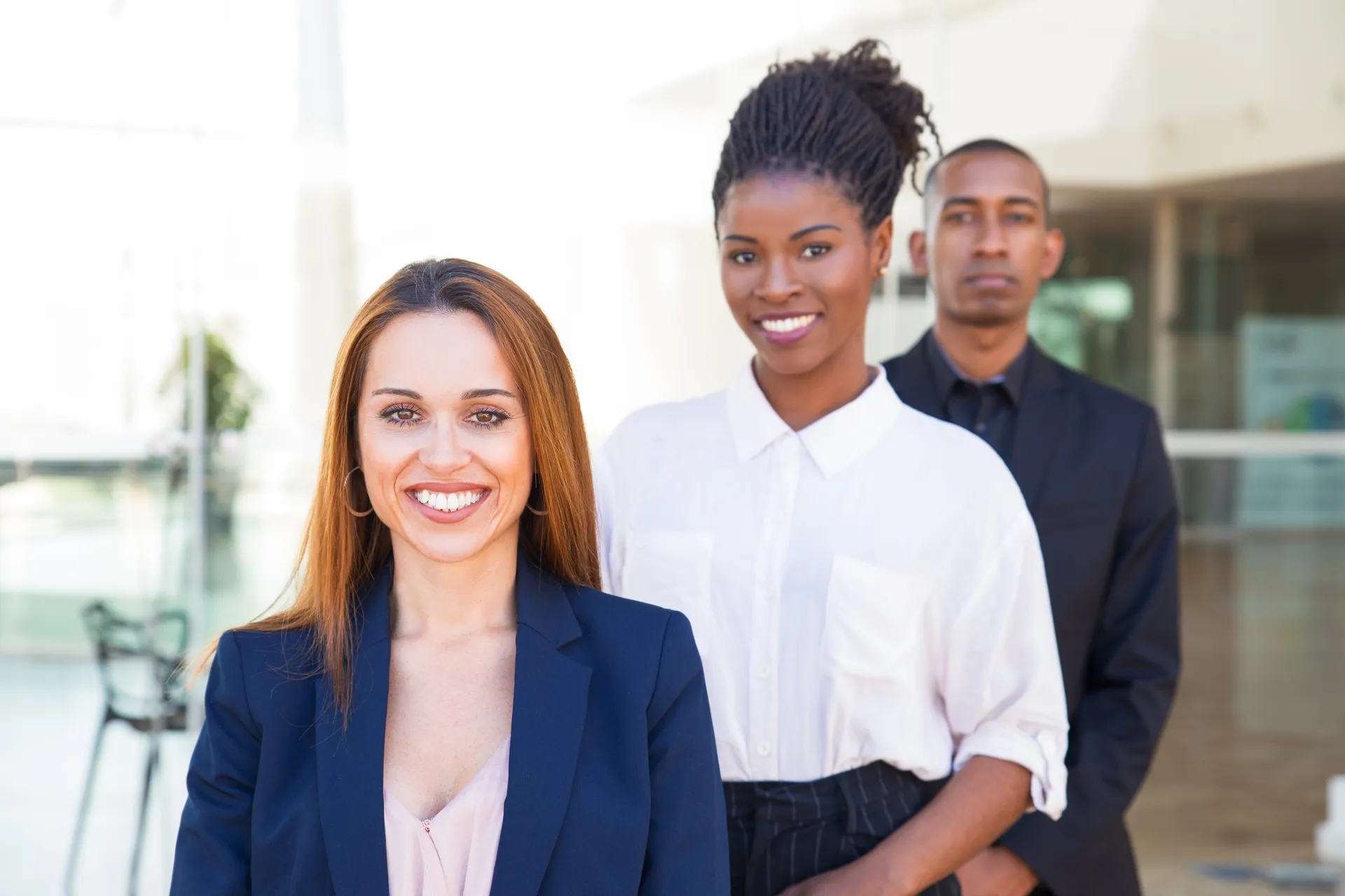 A team of business professionals posing together