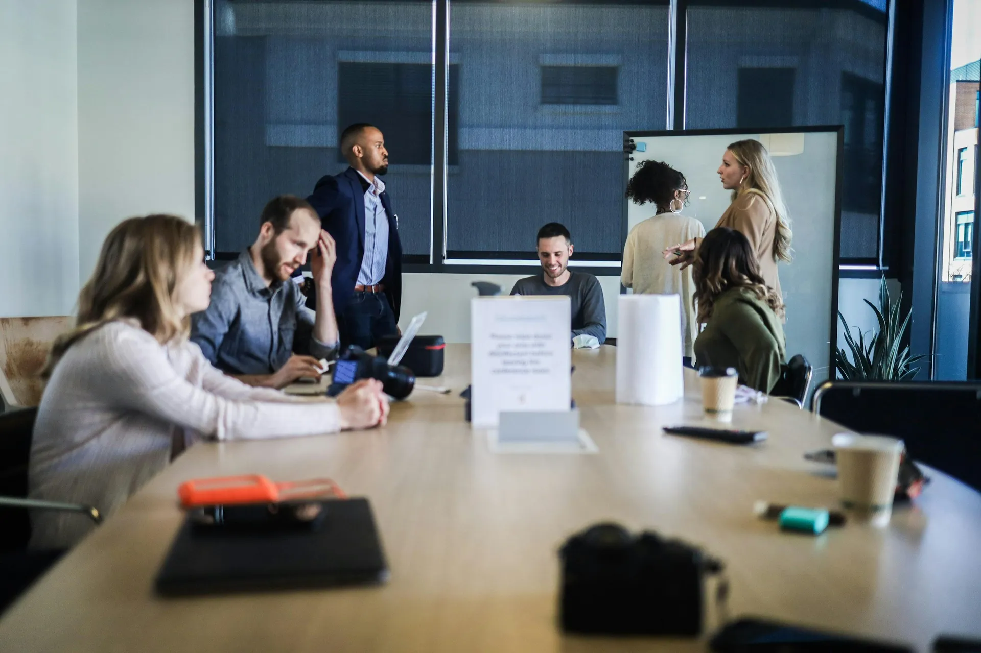 A diverse team collaborating around a conference table